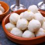 steamed rice balls or kudumulu stacked in a round shallow clay bowl